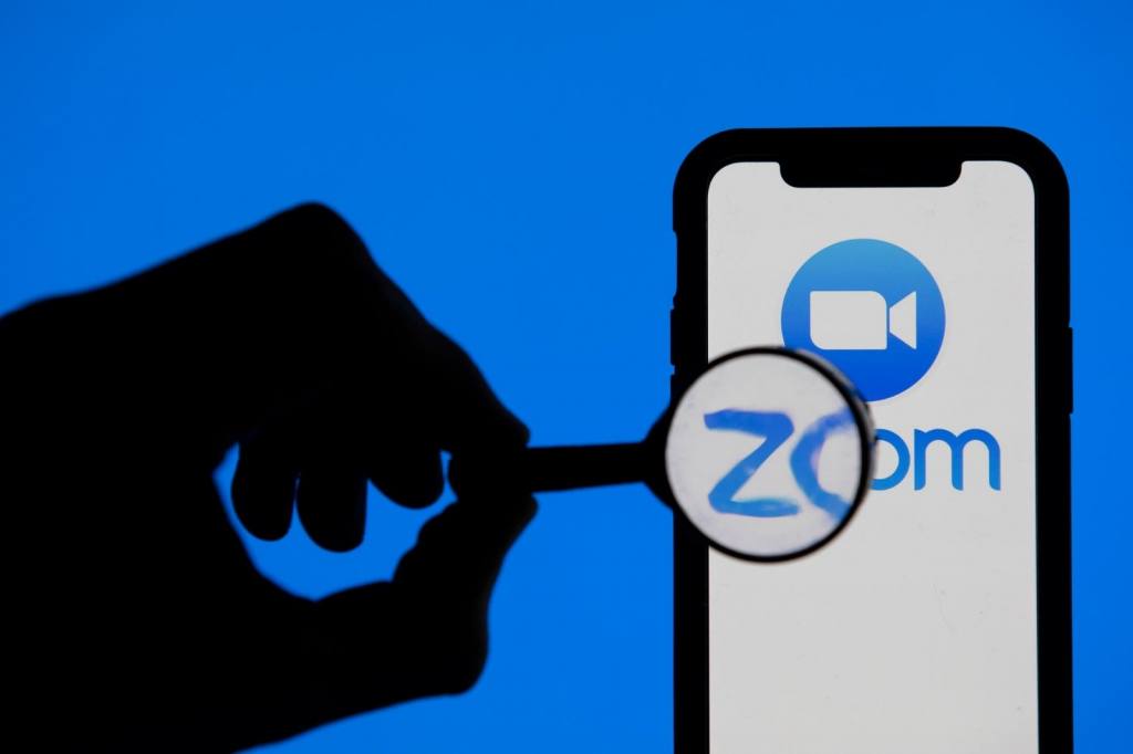 How to mute someone on a Zoom meeting?